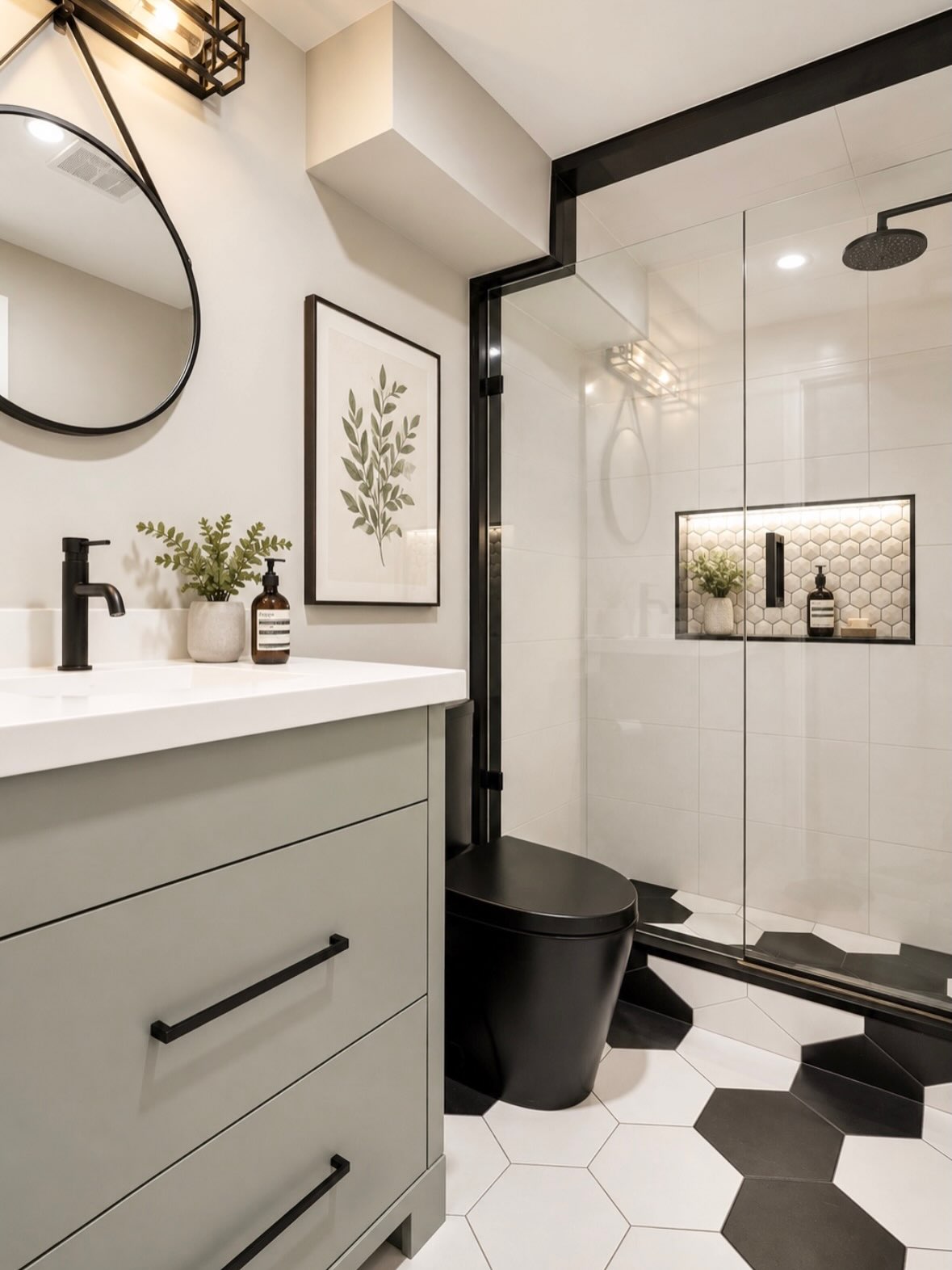 Finished custom bathroom with white shower tile, hexagonal floor tile, and an illuminated mosaic niche
